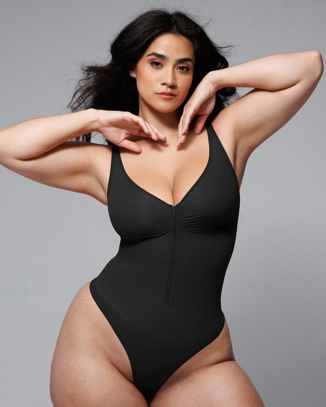 Body moldeador con cremallera frontal y corte tanga
