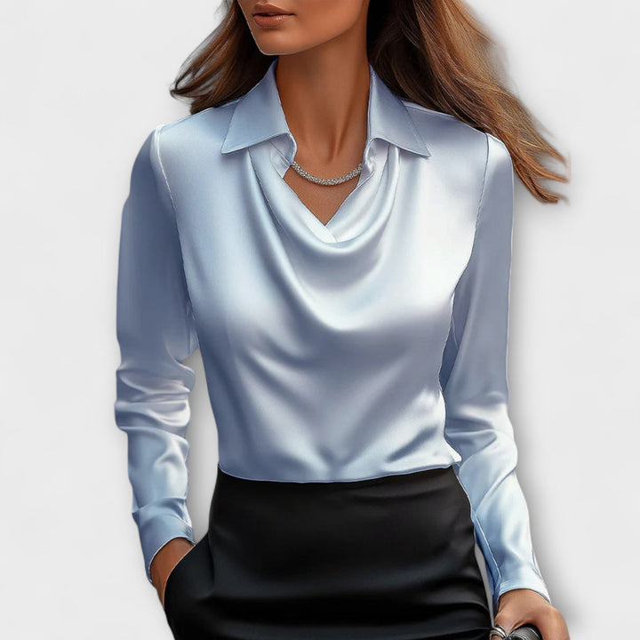 Blusa brillante con cuello fruncido